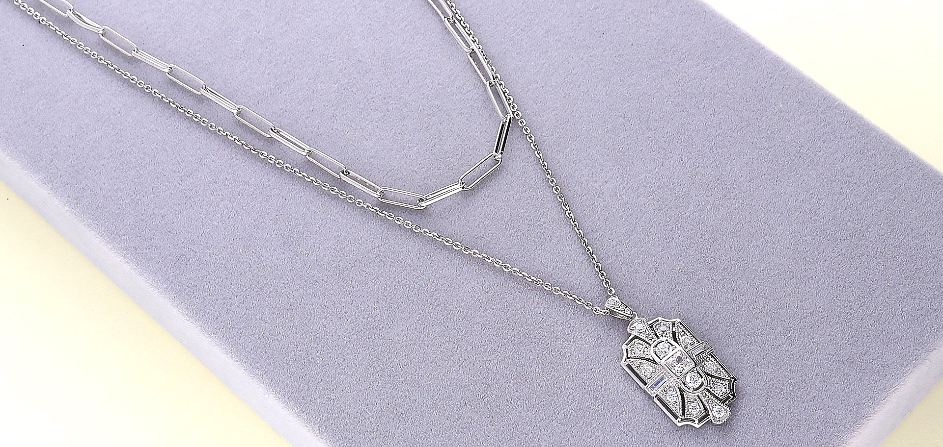 Paperclip chain layer with a bold pendant necklace