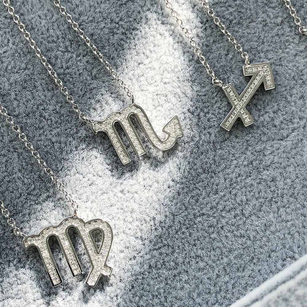 Flatlay view of Zodiac CZ Pendant Necklace in Sterling Silver, Sagittarius