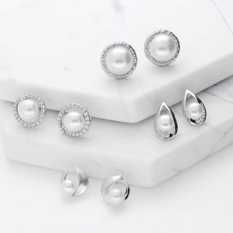 Sophisticated and chic, these timeless Freshwater cultured pearls and imitation pearls are what every woman would love to own. These classic pearl earrings are great for women of all ages and suitable for any occasion. Look elegant everywhere you go.