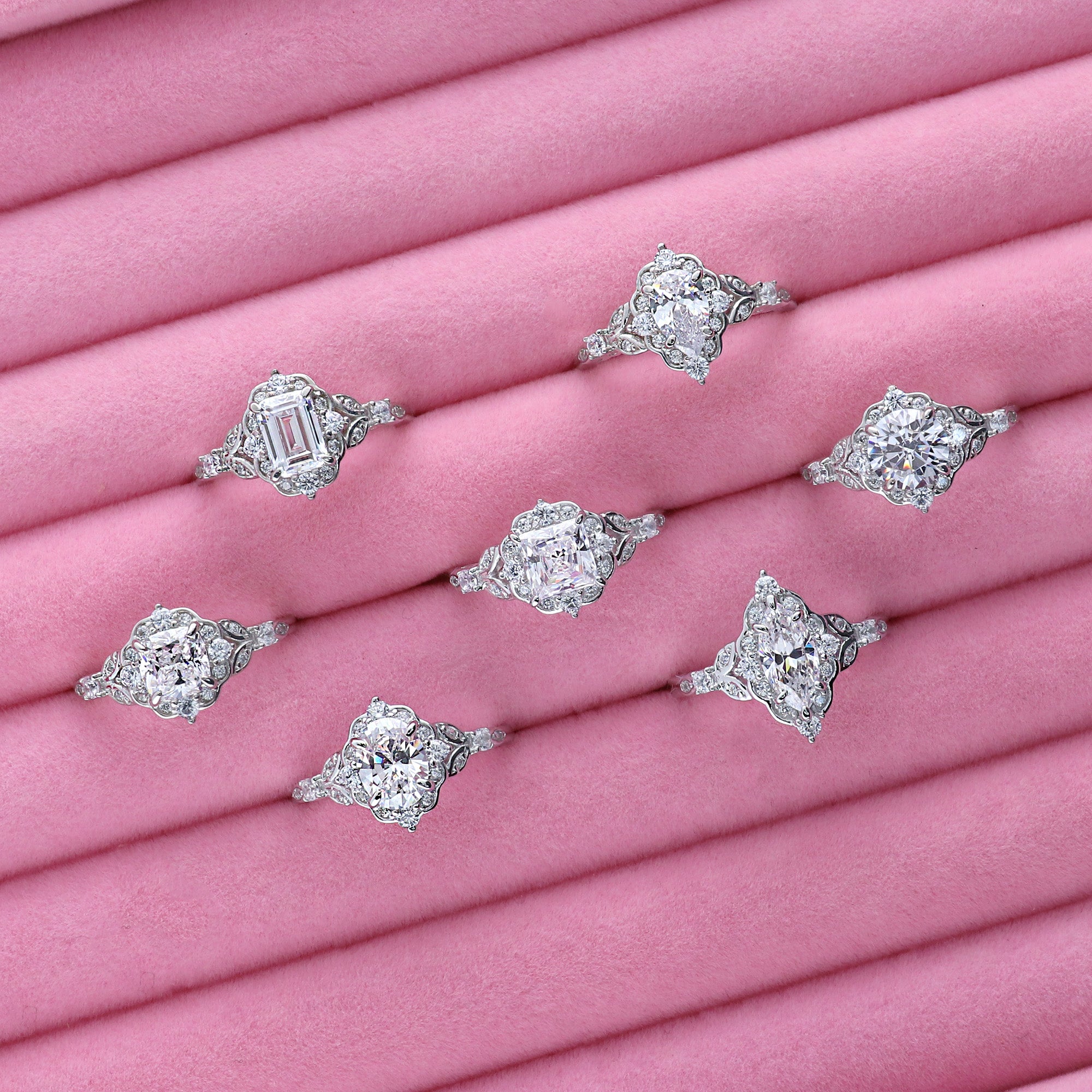 Halo Art Deco Pear CZ Ring in Sterling Silver
