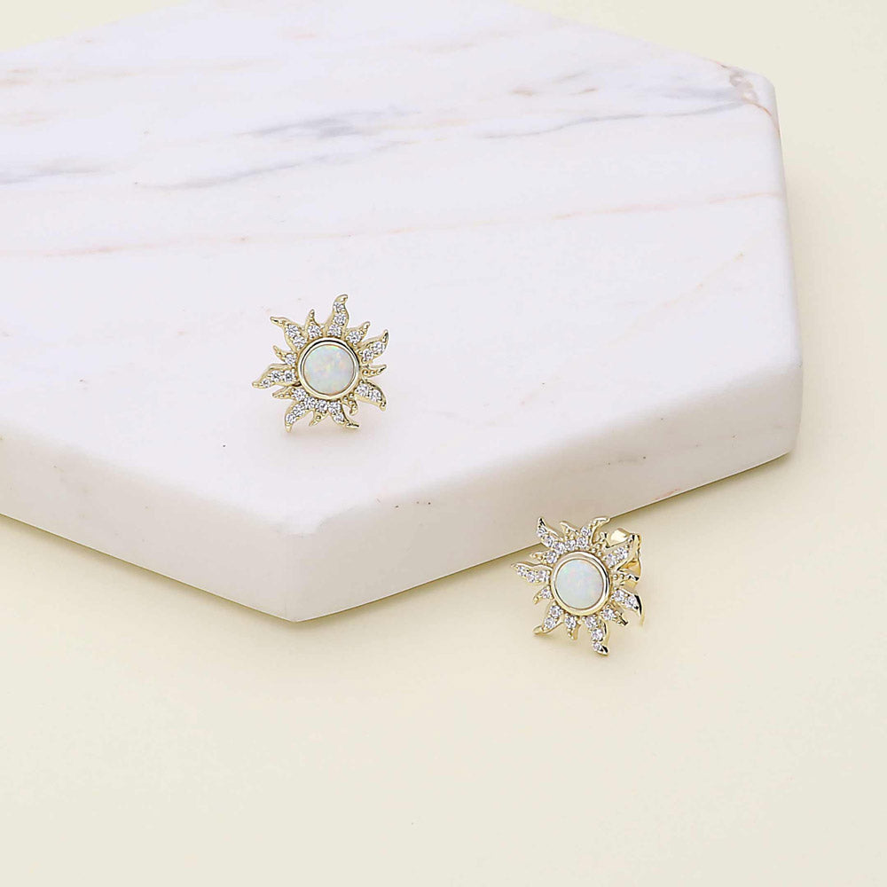 Flatlay view of Halo Sun Simulated Opal Round CZ Set in Gold Flashed Sterling Silver, 6 of 11