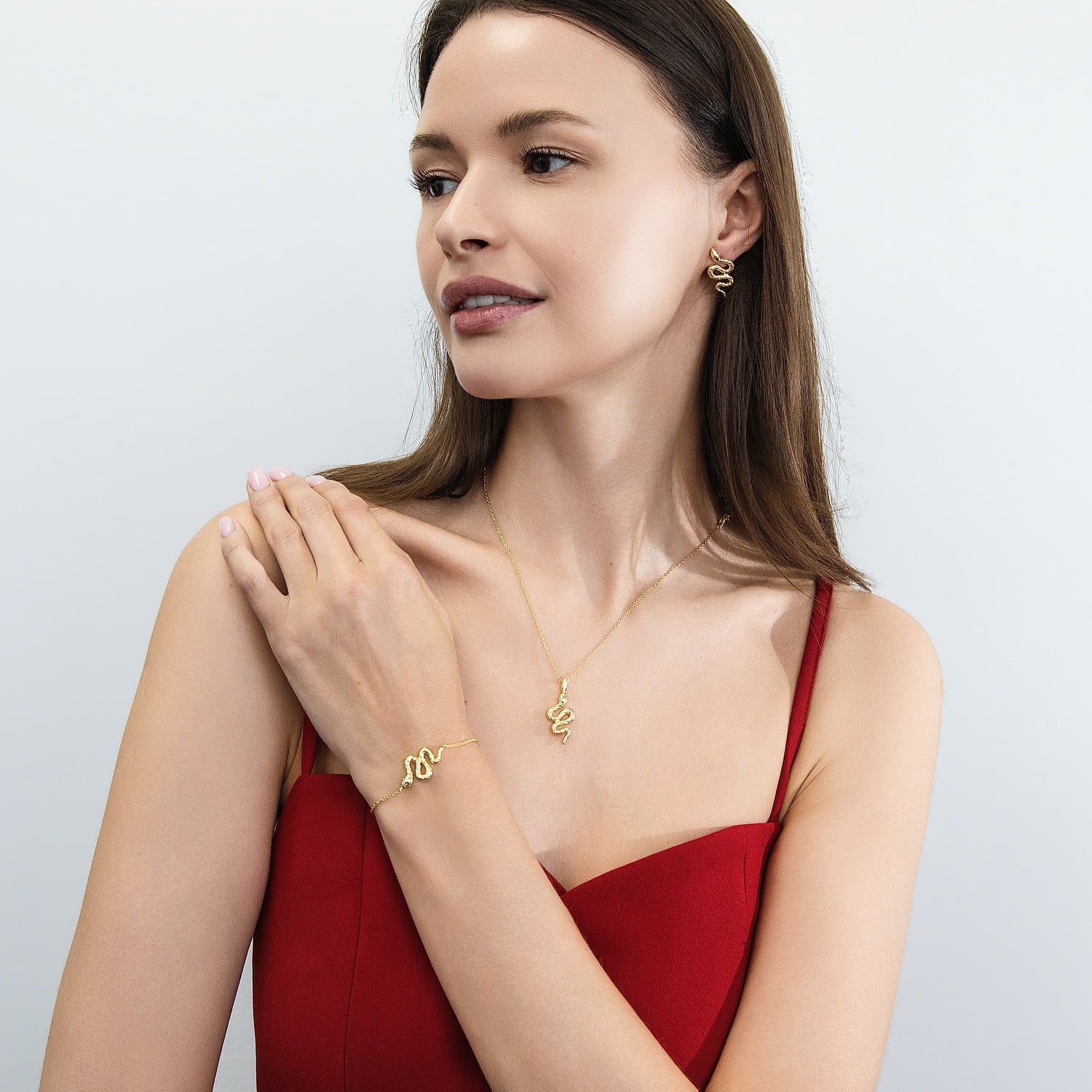 Model wearing Snake CZ Rolo Chain Bracelet in Sterling Silver, Gold Flashed