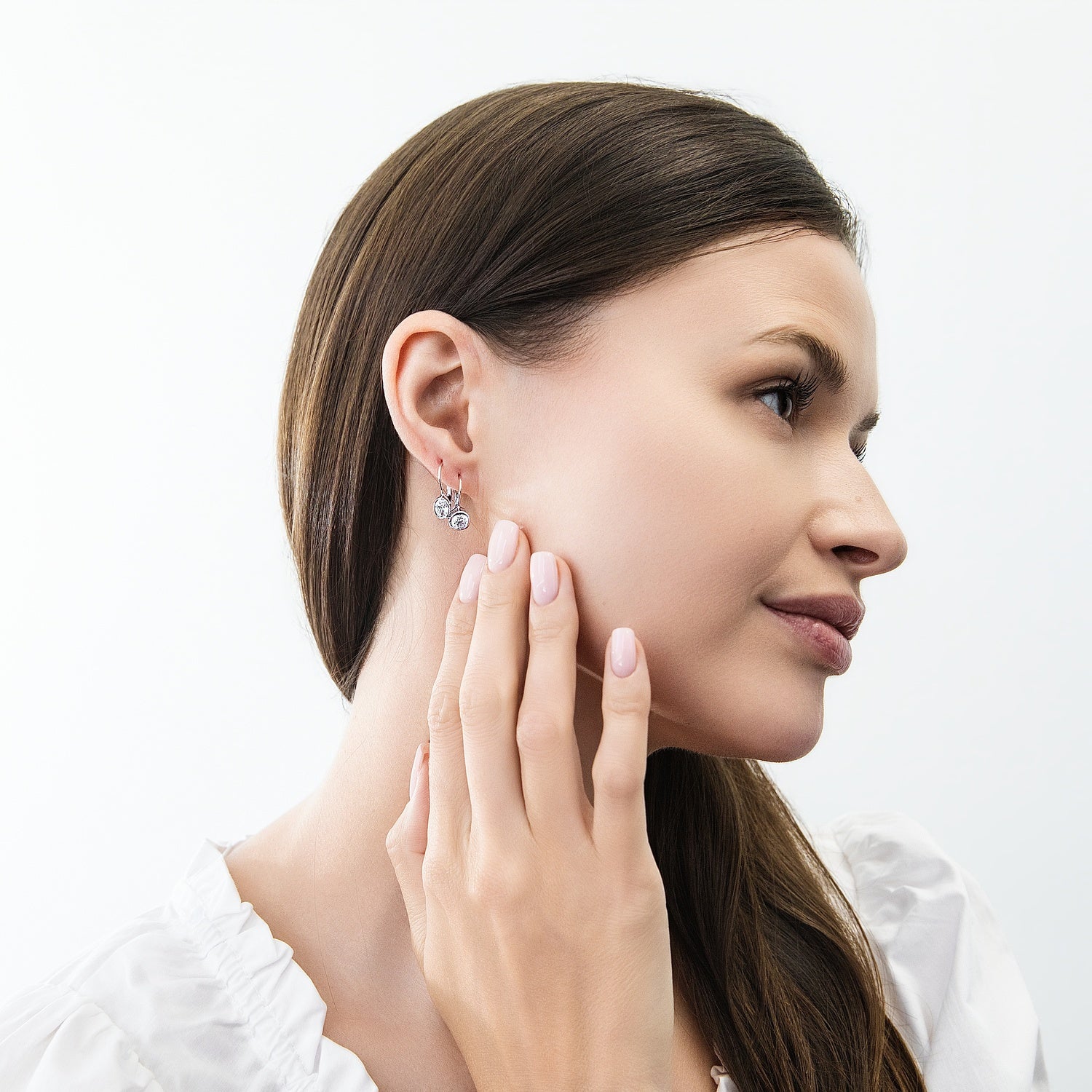 Model wearing Solitaire 1.2ct Bezel CZ Leverback Earrings in Sterling Silver, Clear