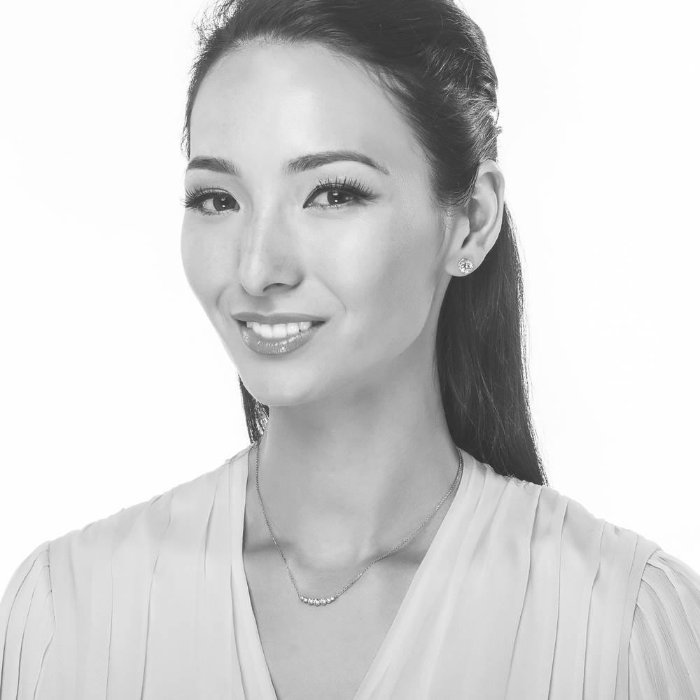 Model Wearing Graduated Pendant Necklace, Solitaire Stud Earrings