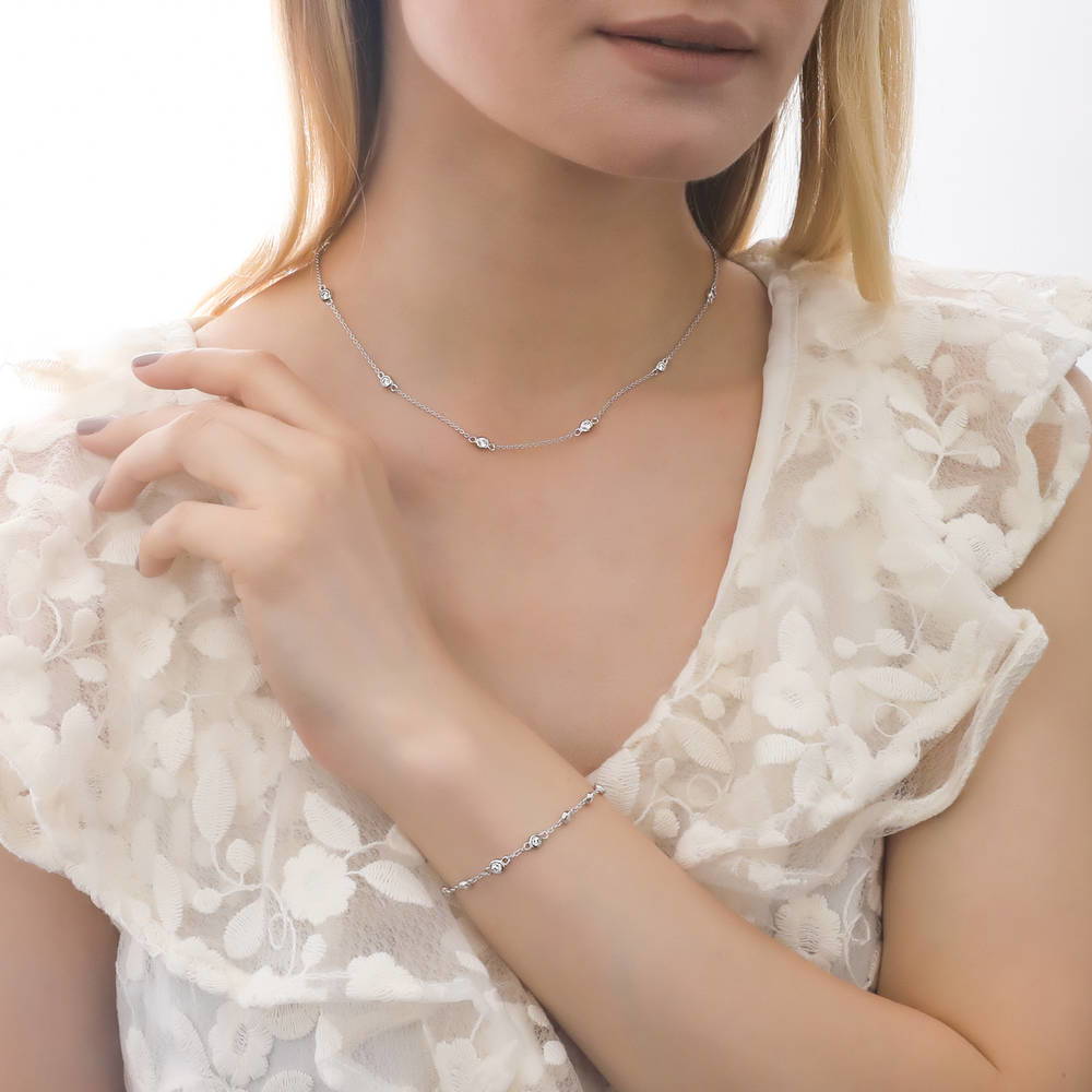 Model wearing Station CZ Station Necklace in Sterling Silver, Yellow Gold Flashed / 16 inch + 2 inch extension