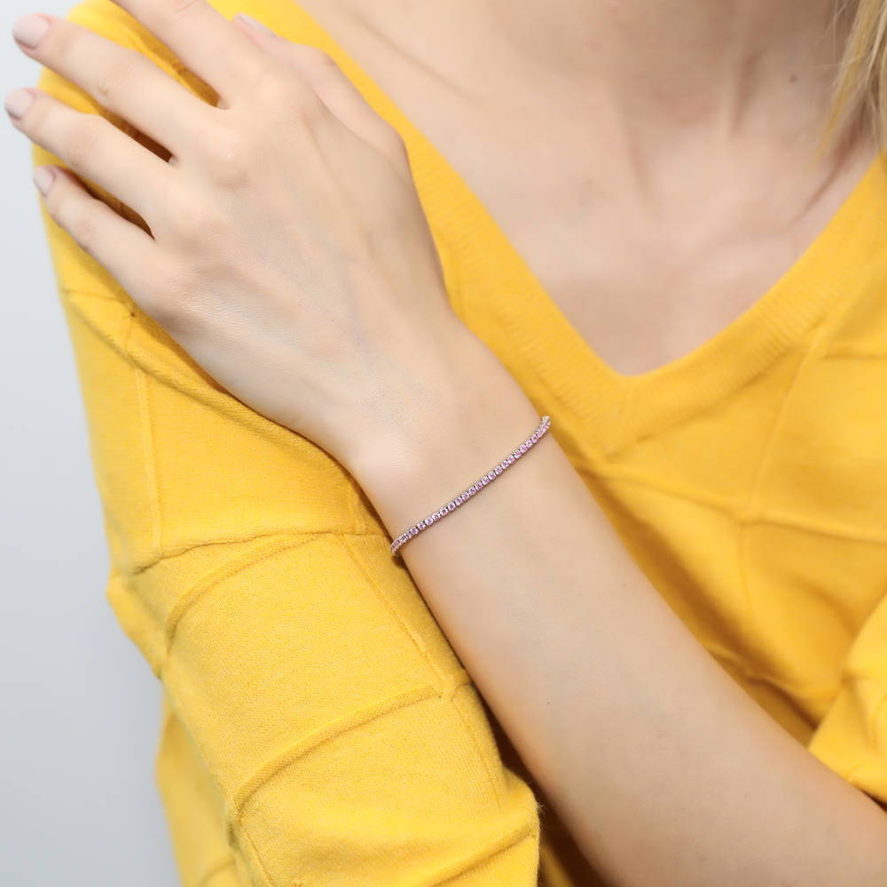 Model wearing CZ Tennis Bracelet Gold Flashed, Pink Color