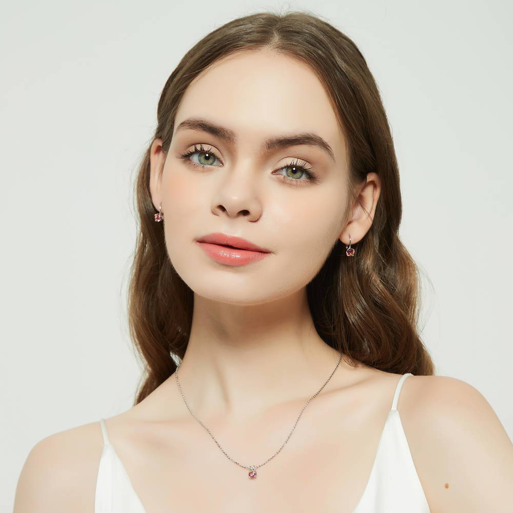 Model wearing Kaleidoscope Solitaire 0.8ct CZ Necklace in Sterling Silver, Red Orange Color