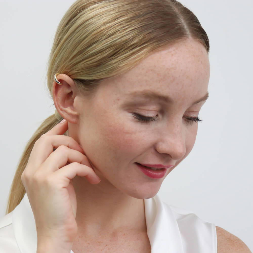 Model wearing Ear Cuff Cartilage Earrings in Sterling Silver, Yellow Gold Flashed