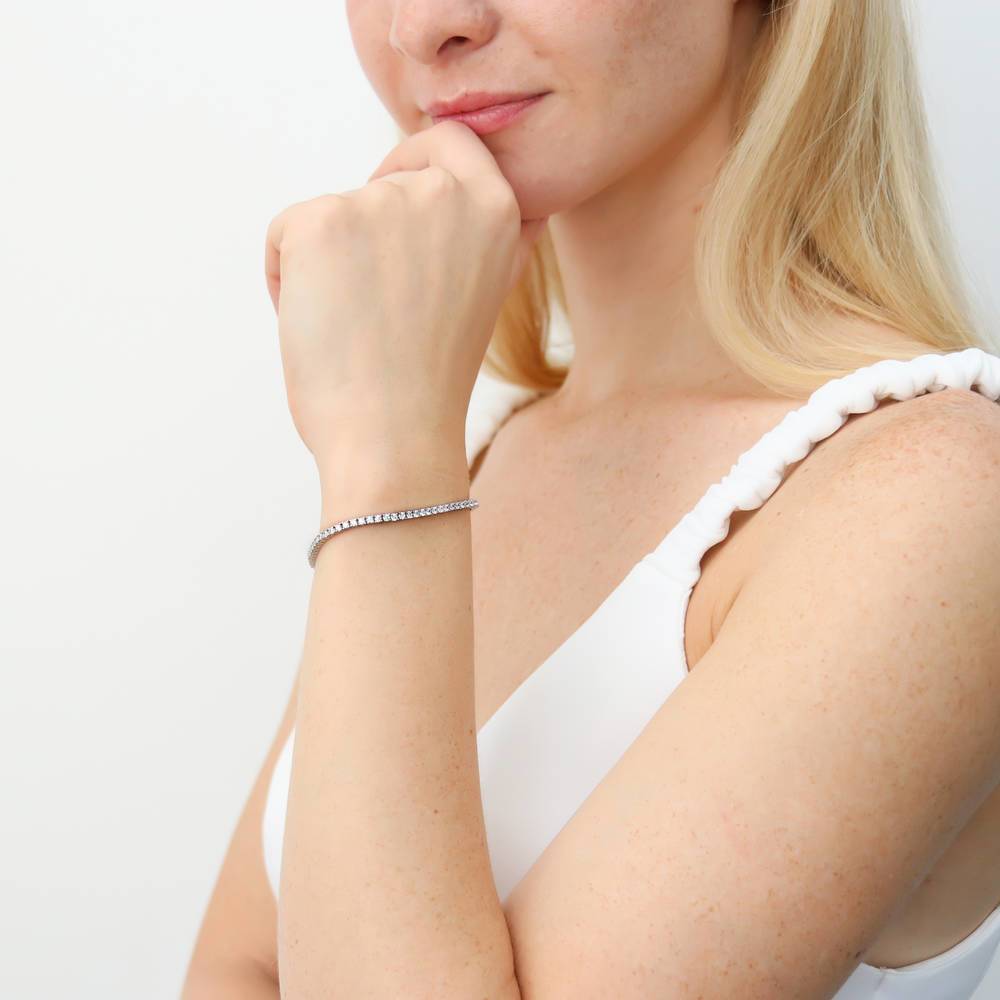 Model wearing Bar CZ Tennis Bracelet in Sterling Silver, Rhodium Plated