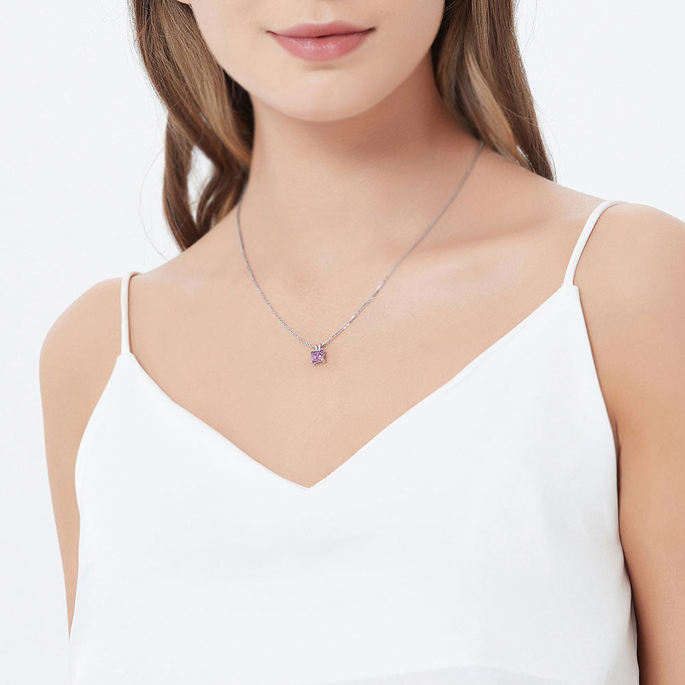 Model wearing Solitaire CZ Necklace in Sterling Silver, Princess Cut / Clear