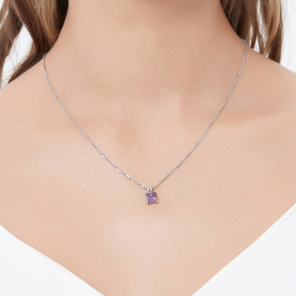 Model wearing Solitaire CZ Necklace in Sterling Silver, Princess Cut / Clear