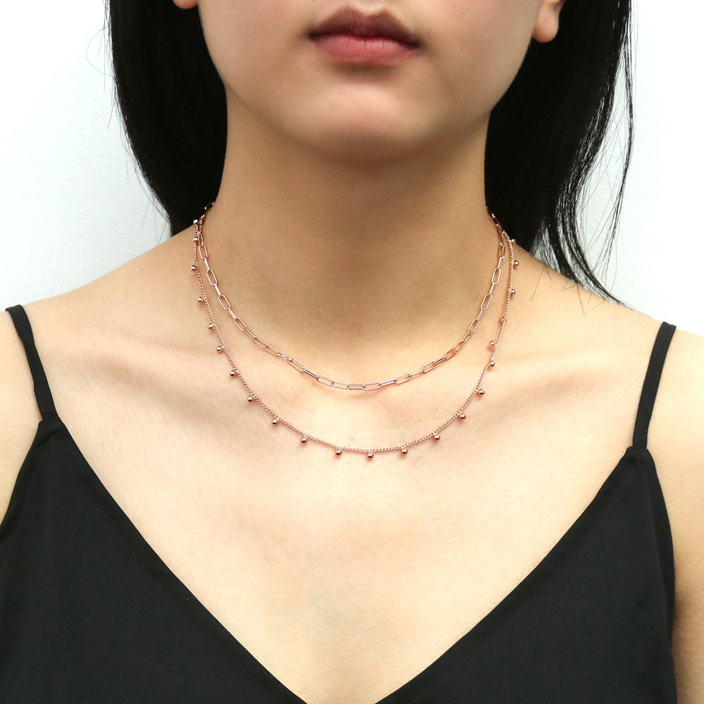 Model wearing Bead Station Necklace, Rose Gold Plated
