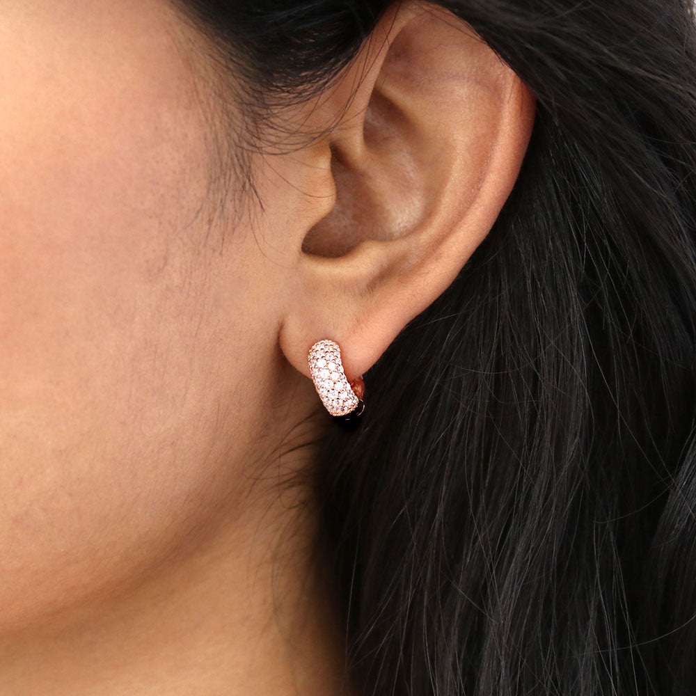 Model wearing Dome CZ Mini Cartilage Huggie Earrings in Sterling Silver 0.5 inch, Rose Gold Flashed