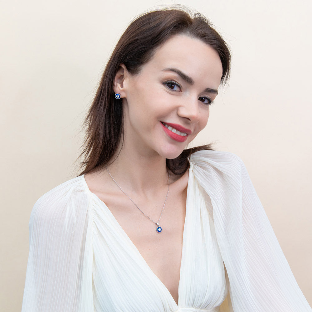 Model wearing Halo Art Deco Round CZ Necklace and Earrings Set in Sterling Silver, 2 of 11