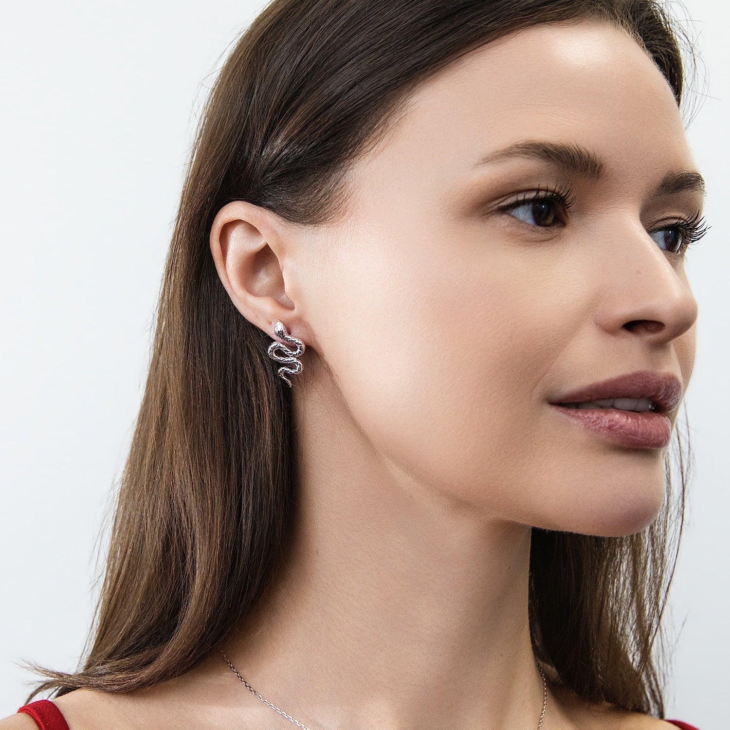 Model wearing Snake CZ Necklace and Earrings in Sterling Silver, Rhodium Plated