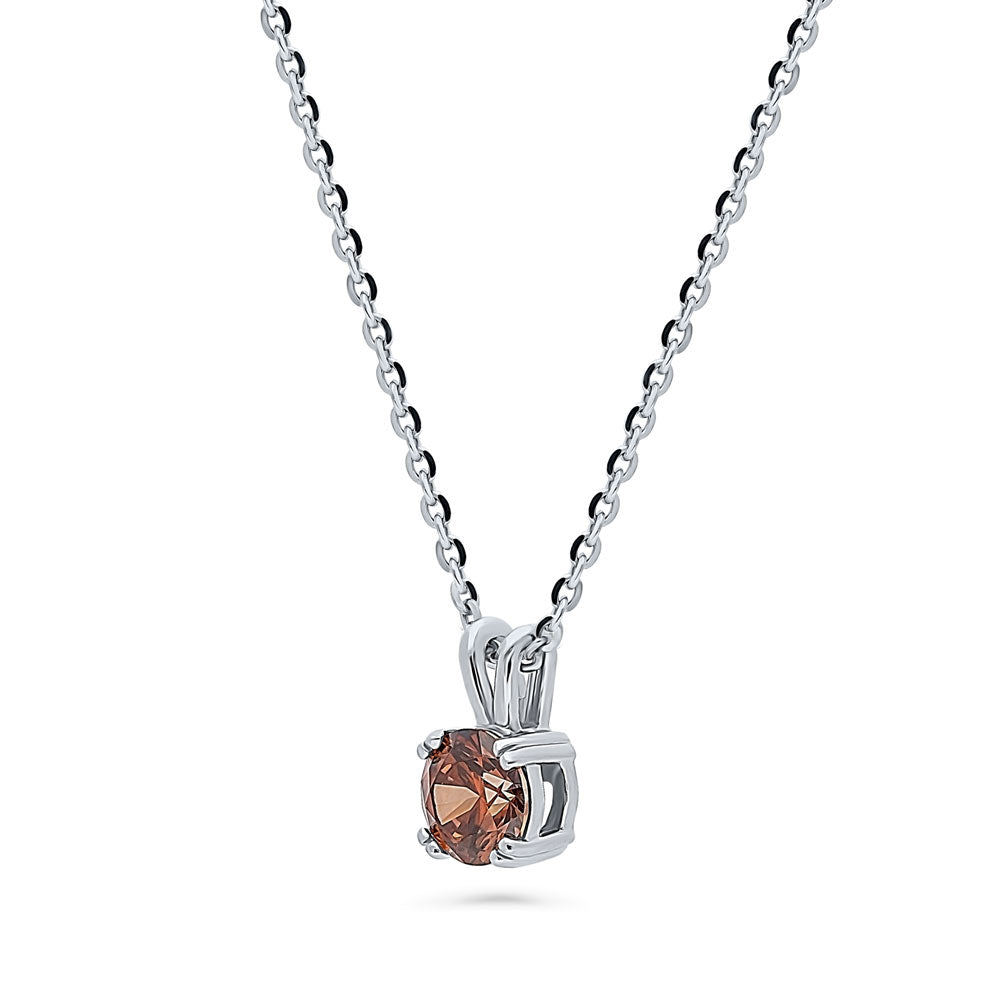 Front view of Solitaire CZ Necklace in Sterling Silver, Round Cut / Caramel