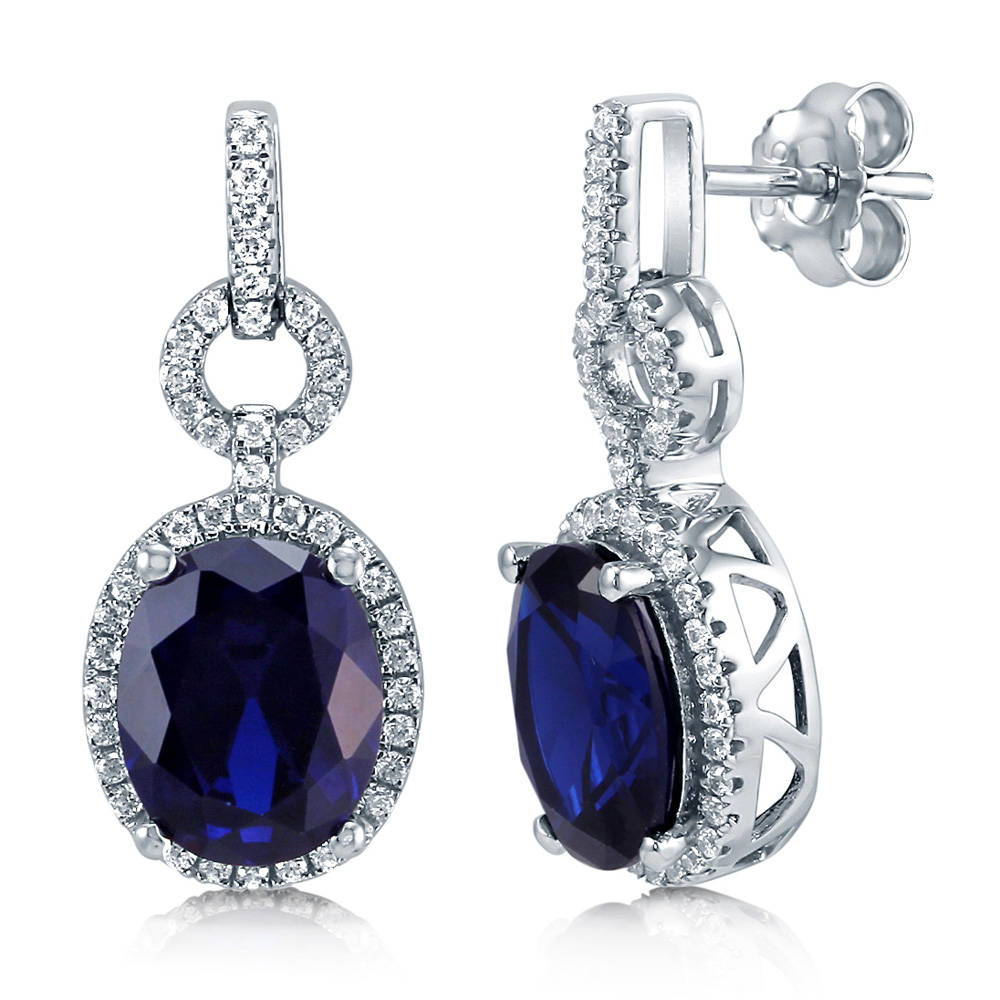 Halo Simulated Blue Sapphire Oval CZ Dangle Earrings in Sterling Silver, 1 of 2