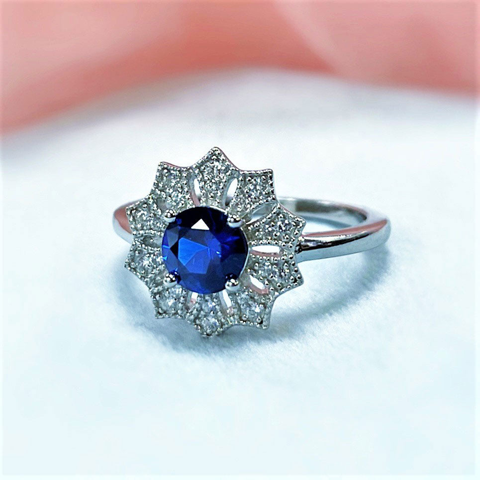 Flower Halo Blue CZ Ring in Sterling Silver