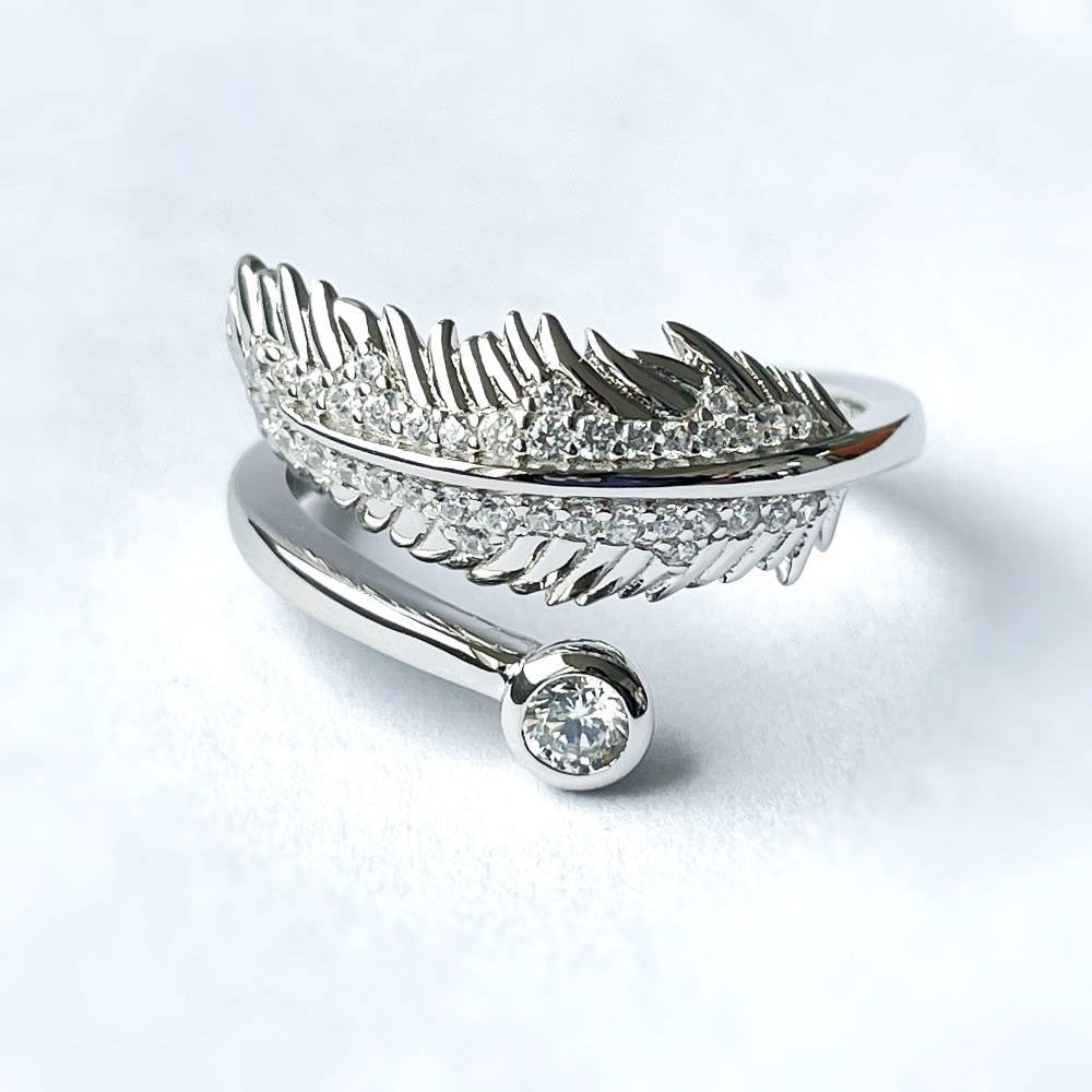 Flatlay view of Feather Bypass CZ Ring in Sterling Silver, 9 of 9