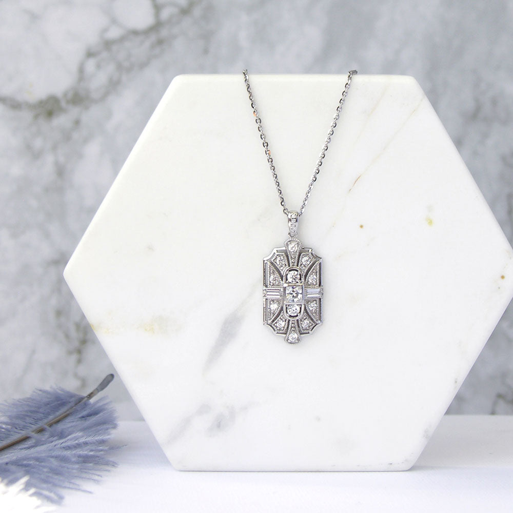 Flatlay view of Art Deco Milgrain CZ Necklace and Earrings Set in Sterling Silver, 5 of 12