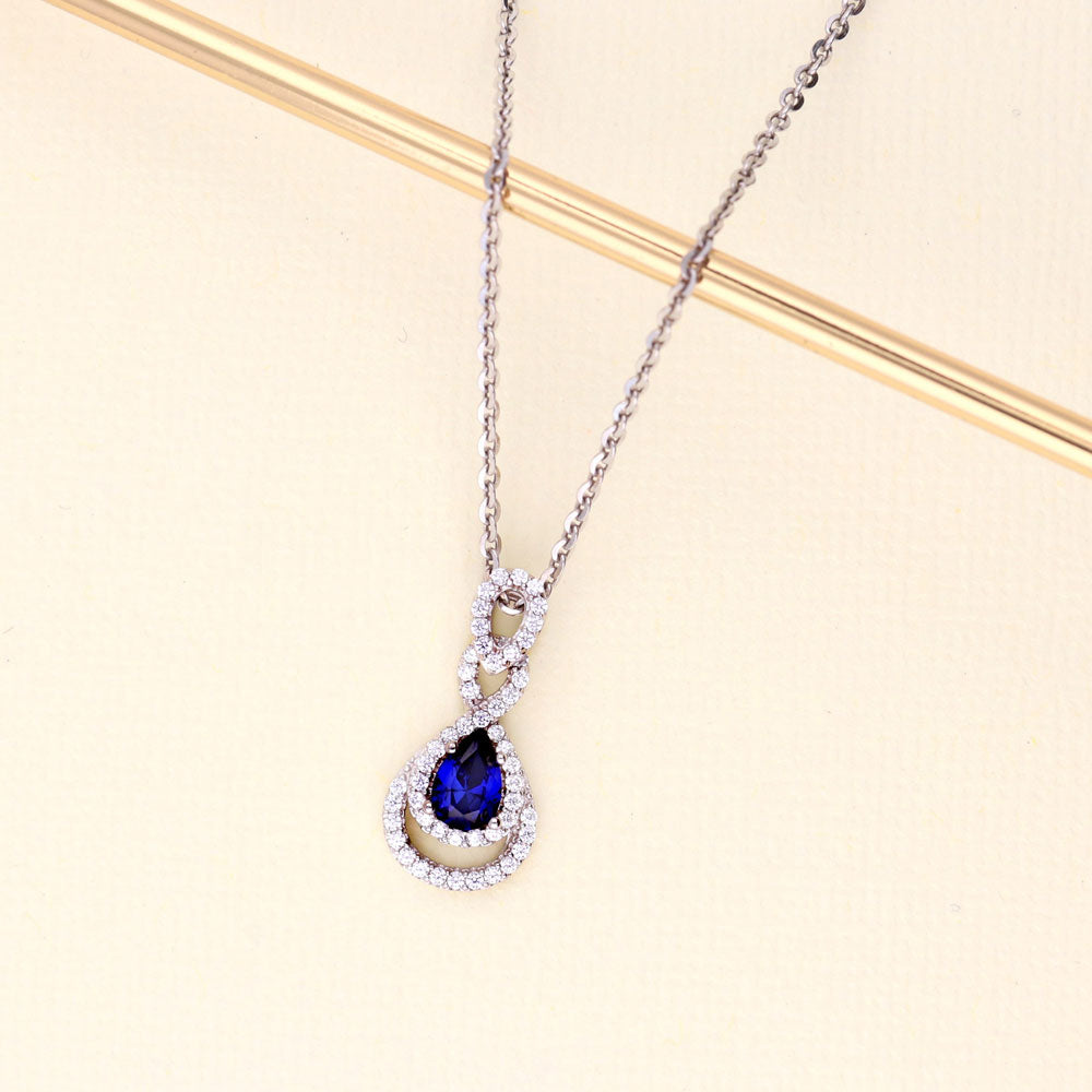 Flatlay view of Teardrop Simulated Blue Sapphire CZ Set in Sterling Silver, 10 of 12