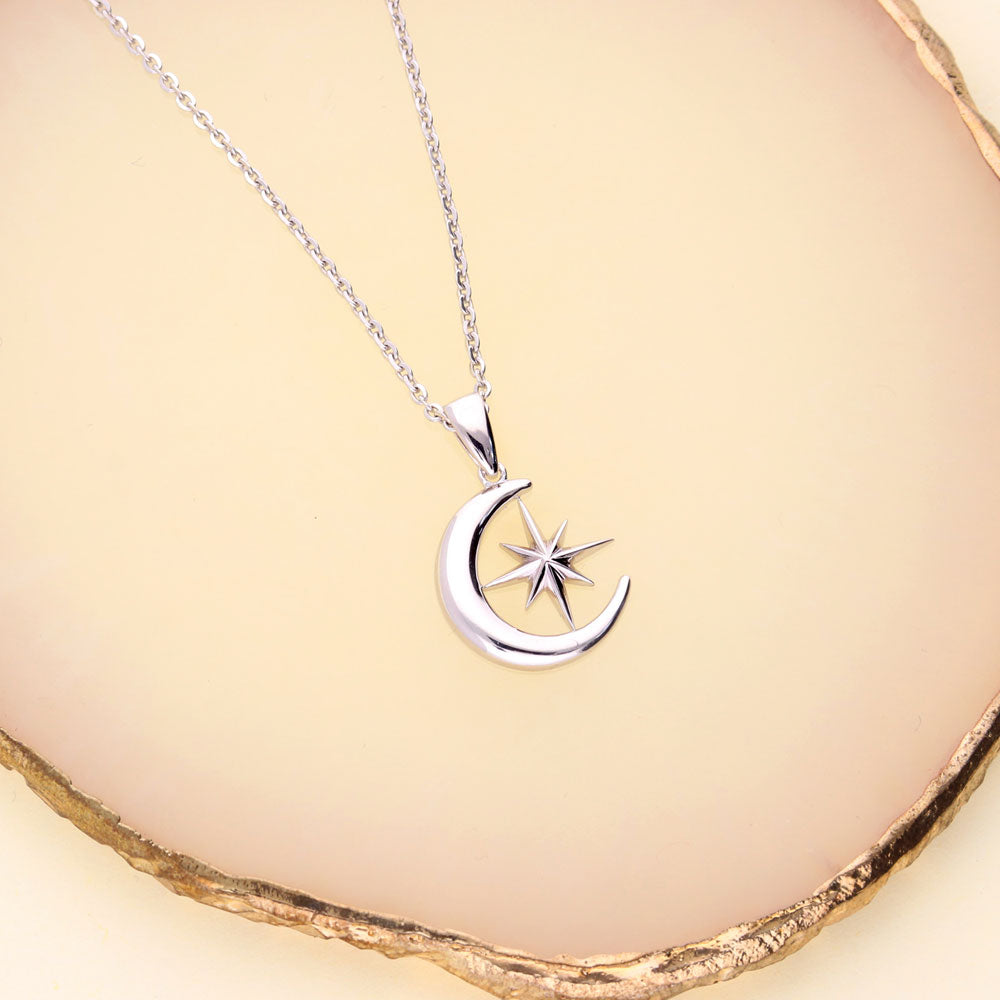 Flatlay view of Crescent Moon North Star Necklace and Earrings Set in Sterling Silver, 11 of 13