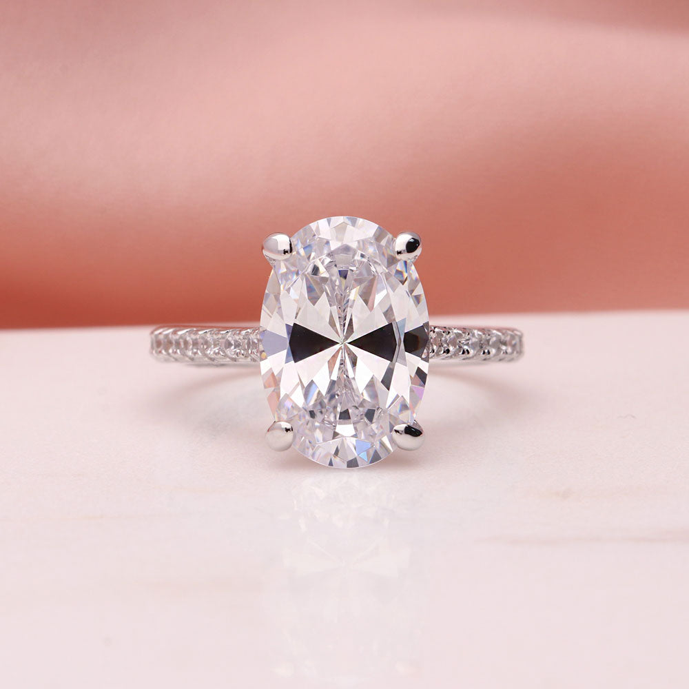 Flatlay view of Solitaire 5.5ct Oval CZ Ring Set in Sterling Silver, 11 of 12