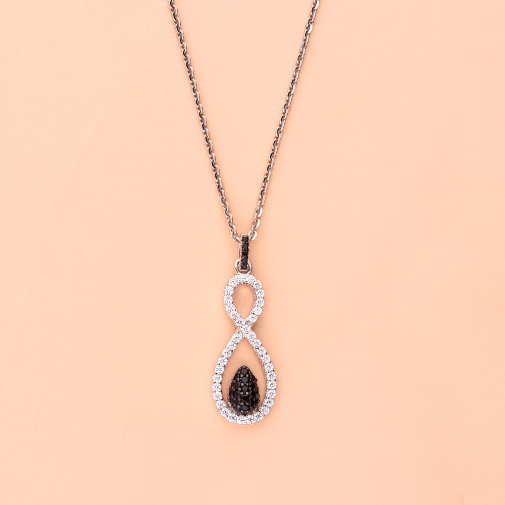 Flatlay view of Black and White Infinity CZ Set in Sterling Silver, 12 of 14