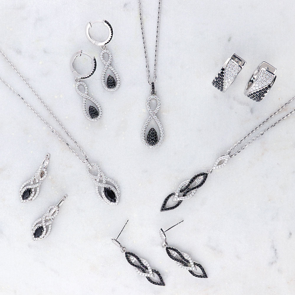 Flatlay view of Black and White Infinity CZ Set in Sterling Silver, 7 of 14