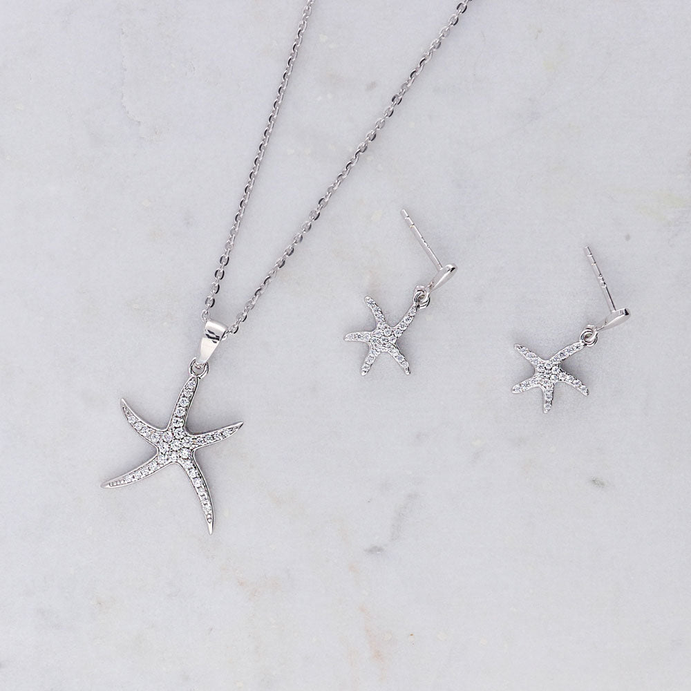 Flatlay view of Starfish CZ Necklace and Earrings Set in Sterling Silver, 2 of 7