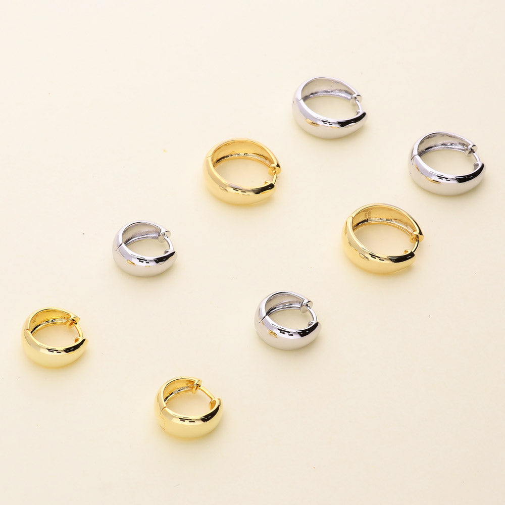 Flatlay view of Dome CZ Small Huggie Earrings in Sterling Silver 0.6 inch, Rhodium Plated