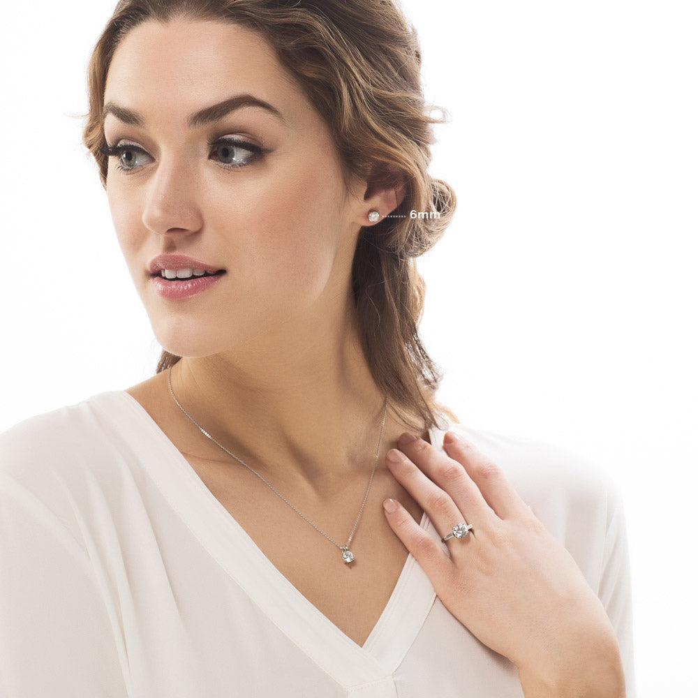 Model wearing Solitaire Round CZ Necklace and Earrings Set in Sterling Silver, 10 of 12