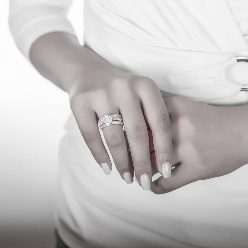 Model wearing Halo Pear CZ Statement Ring Set in Sterling Silver, 2 of 7