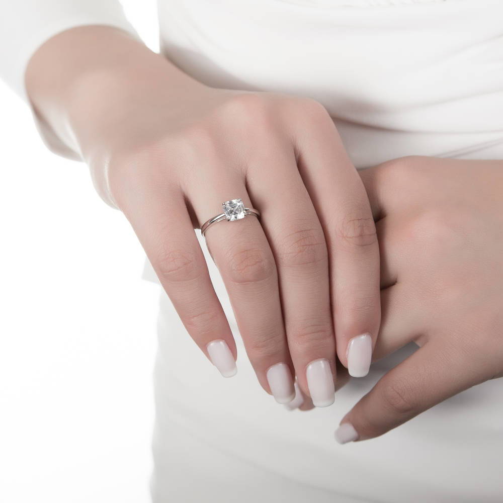 Model wearing Solitaire 2ct Asscher CZ Ring in Sterling Silver, 2 of 5