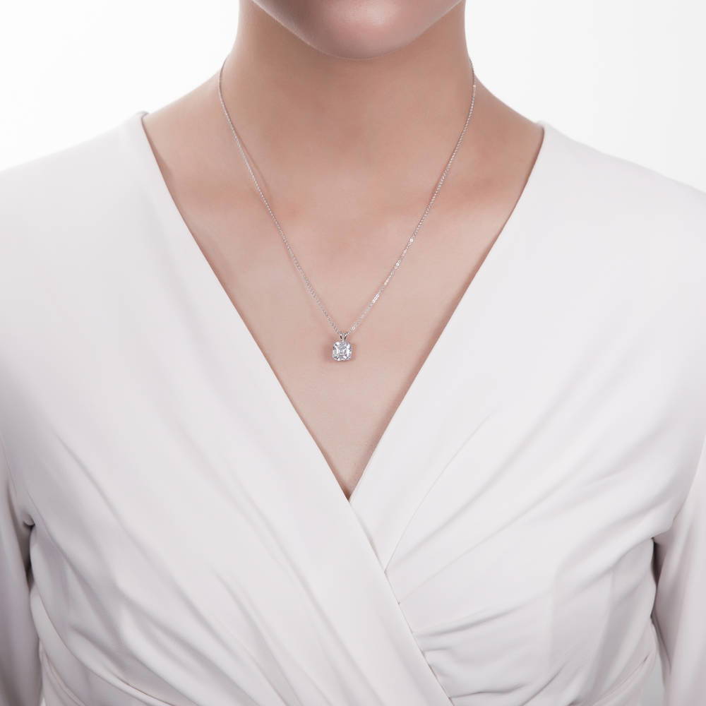Model wearing Solitaire Asscher CZ Necklace and Earrings Set in Sterling Silver, 13 of 16