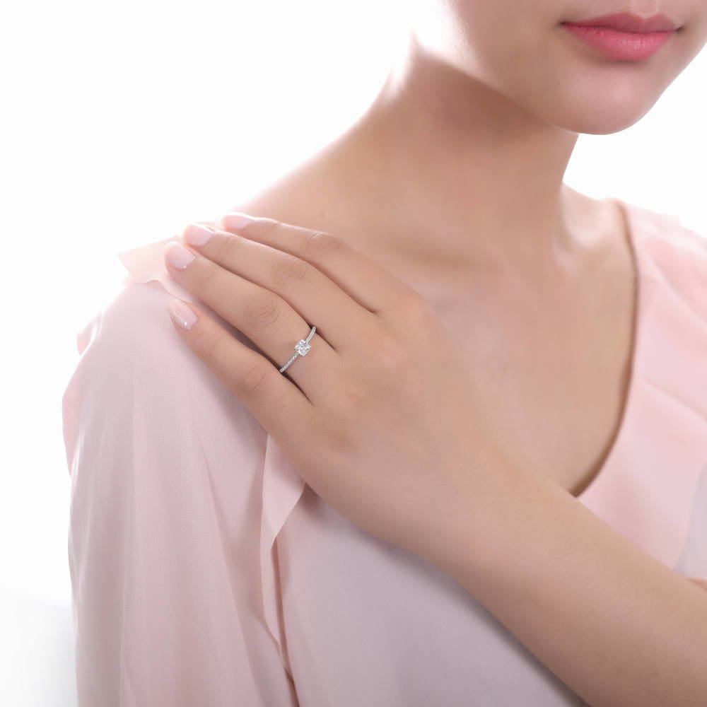 Model wearing Solitaire 0.6ct Cushion CZ Ring Set in Sterling Silver, 5 of 7