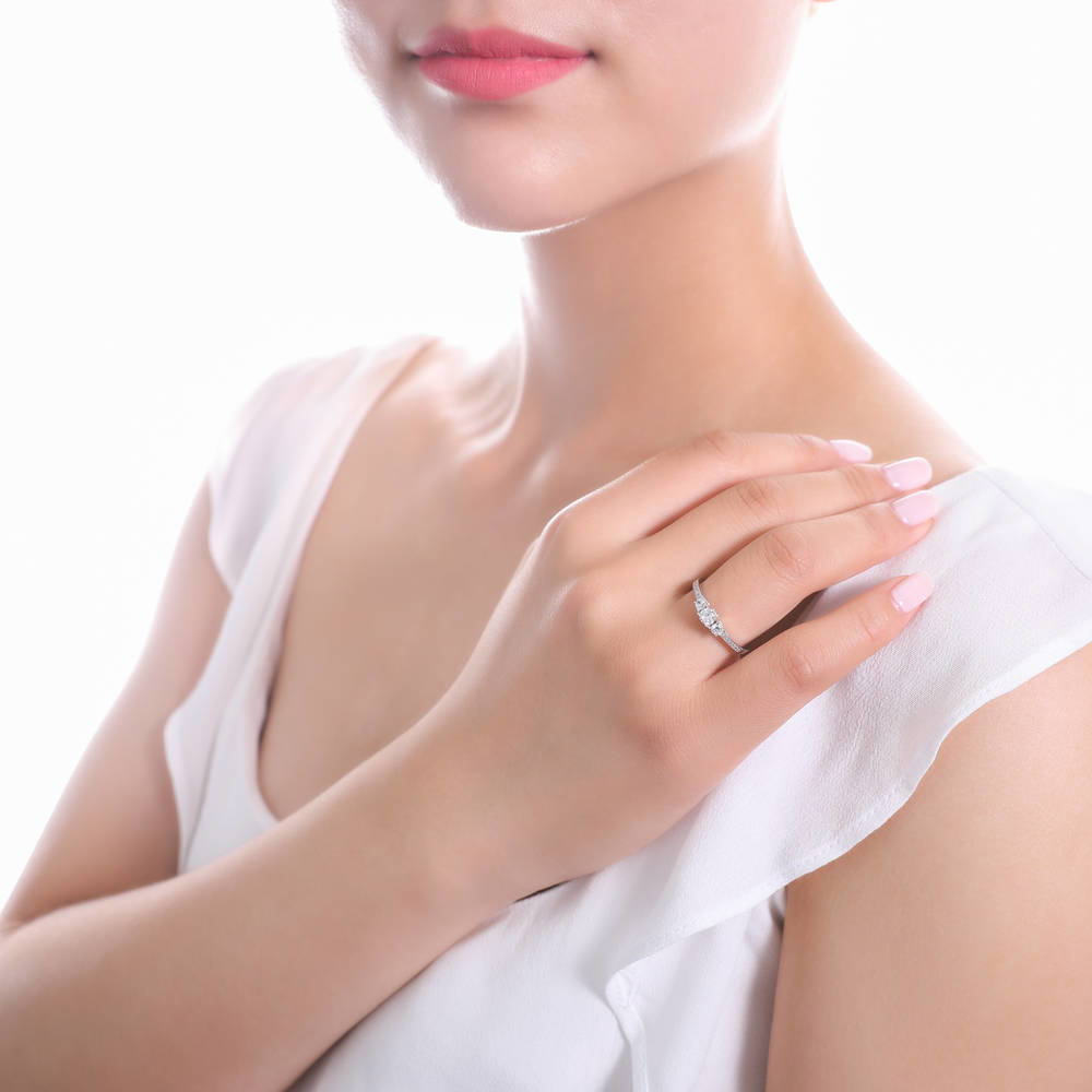 Model wearing 3-Stone Round CZ Ring in Sterling Silver, 2 of 6