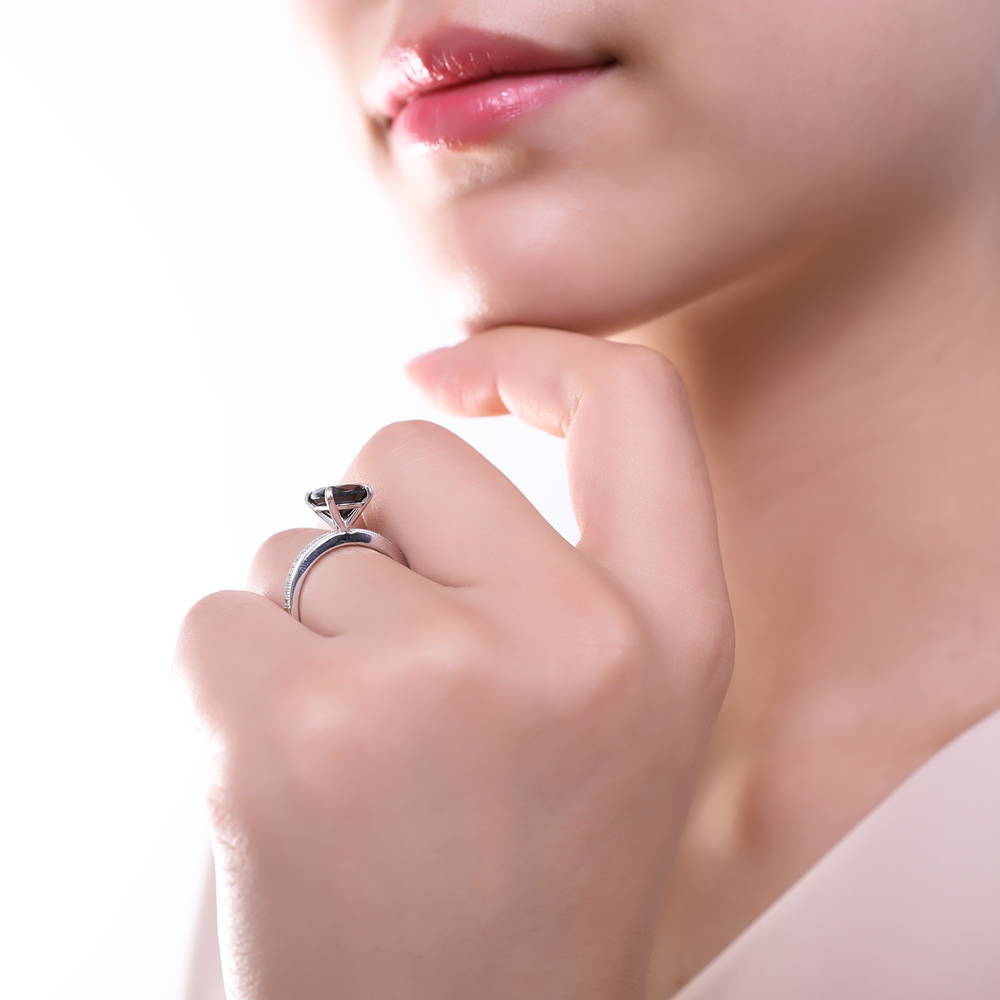 Model wearing Solitaire 3ct Black Cushion CZ Stackable Ring Set in Sterling Silver, 7 of 9