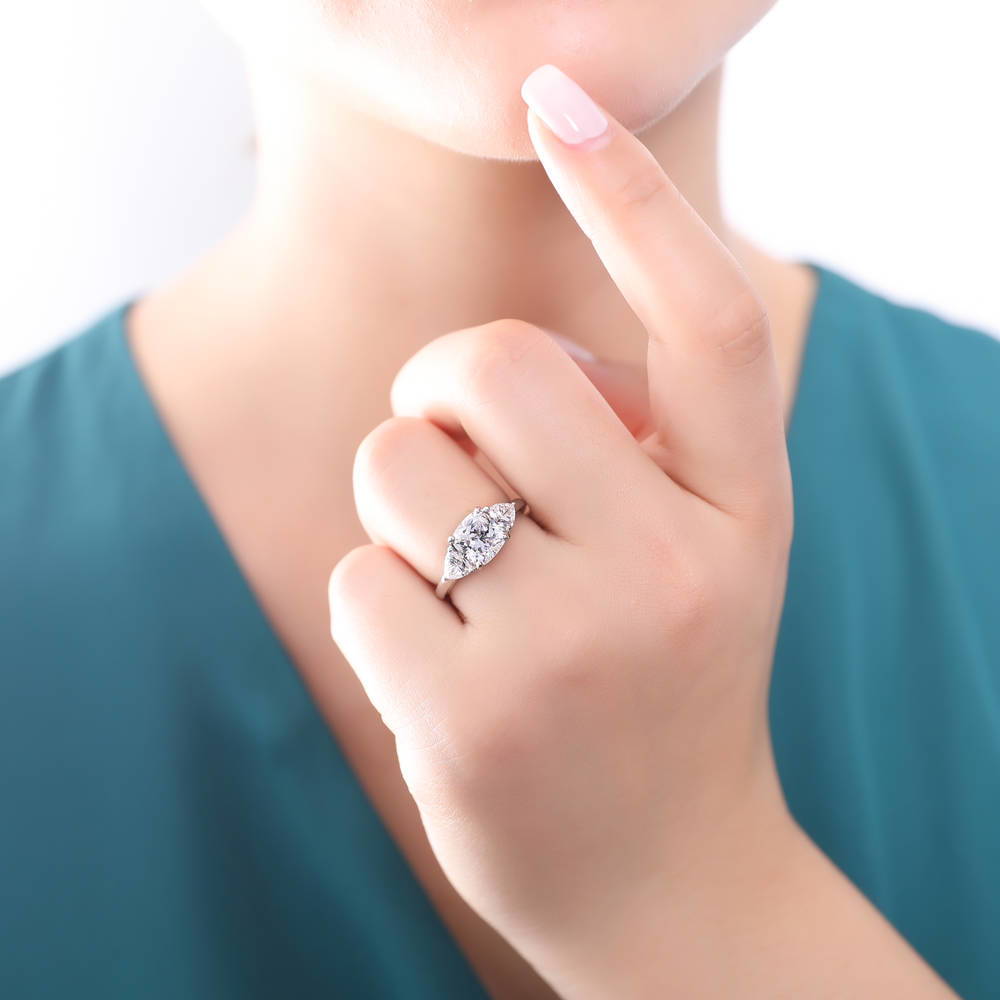 Model wearing 3-Stone Criss Cross Cushion CZ Ring Set in Sterling Silver, 8 of 13