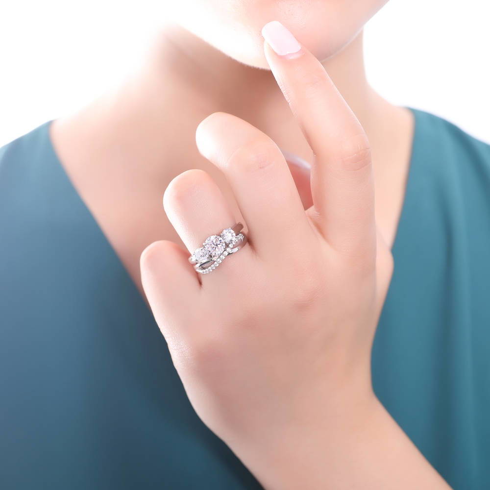 Model wearing 3-Stone Criss Cross Round CZ Ring Set in Sterling Silver, 2 of 12