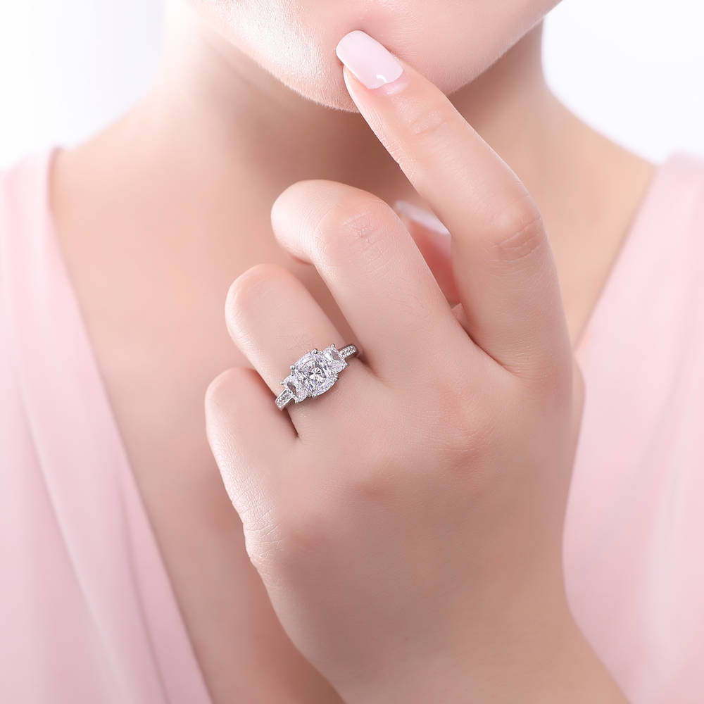 Model wearing 3-Stone Cushion CZ Ring in Sterling Silver, 2 of 9