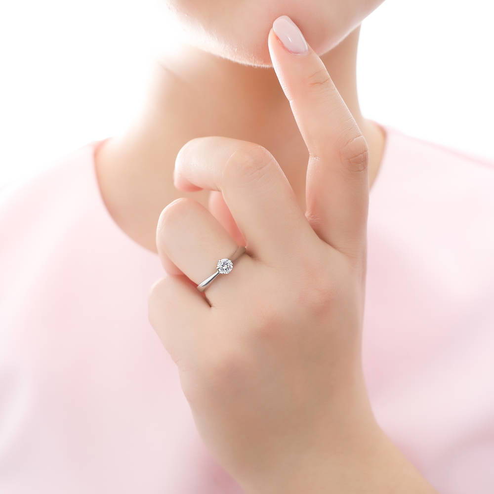 Model wearing Solitaire 0.45ct Round CZ Ring Set in Sterling Silver, 5 of 9