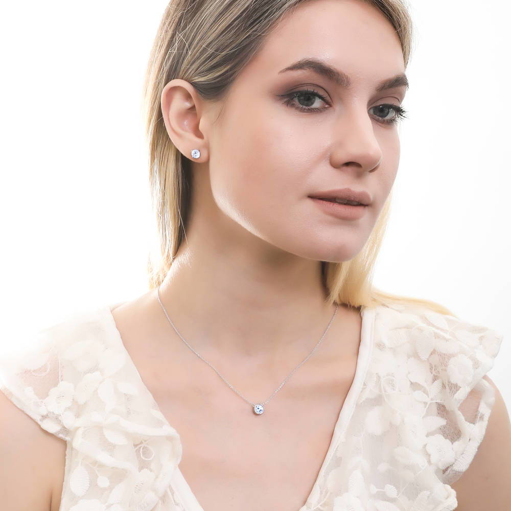 Model wearing Solitaire Round CZ Stud Earrings in Sterling Silver 1.6ct, 10 of 12