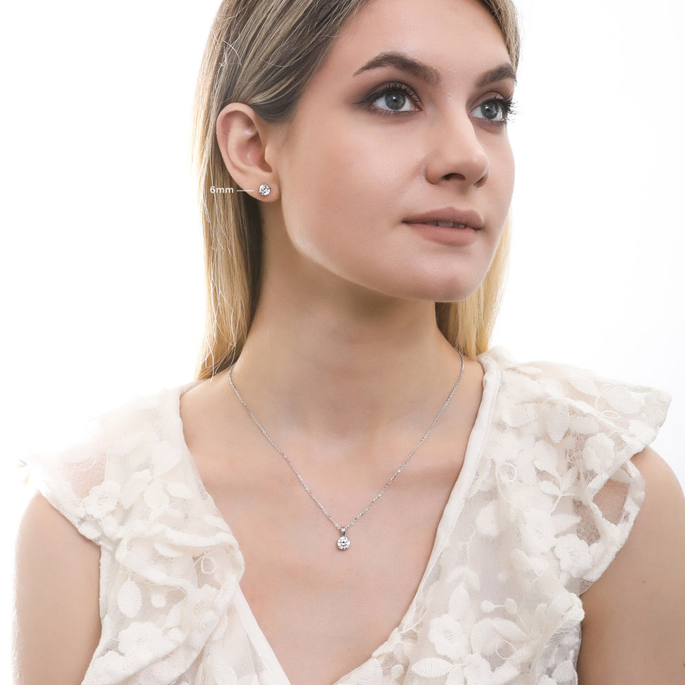 Model wearing Solitaire Round CZ Necklace and Earrings Set in Sterling Silver, 9 of 12