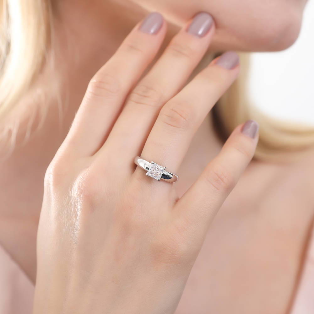 Model wearing Solitaire 1.2ct Princess CZ Ring in Sterling Silver, 3 of 9