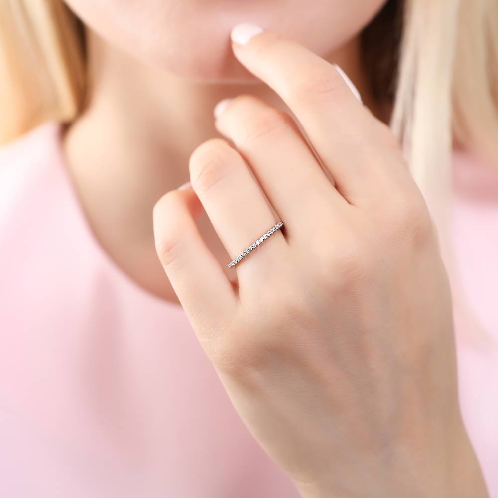 Model wearing Pave Set CZ Eternity Ring in Sterling Silver, 3 of 5
