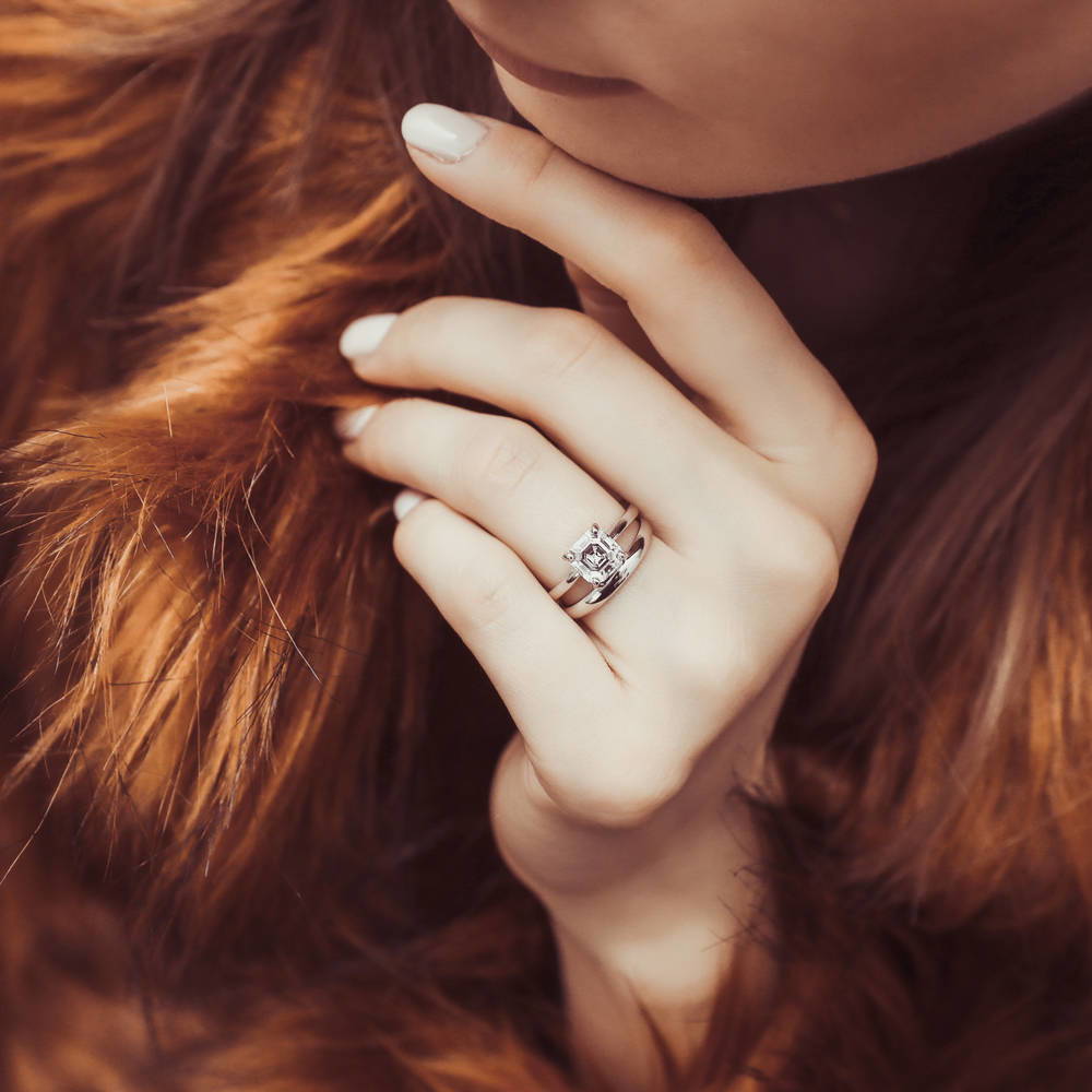 Model wearing Solitaire 2ct Asscher CZ Ring Set in Sterling Silver, 2 of 8