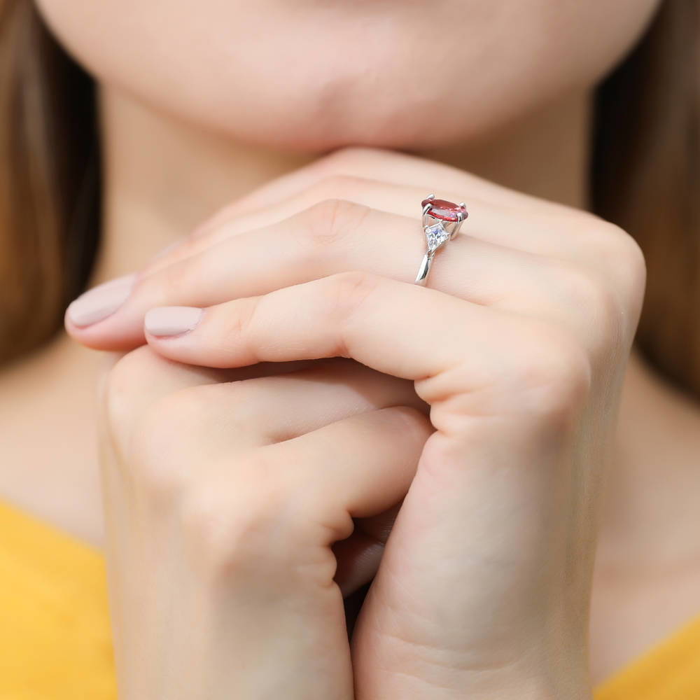 Model wearing 3-Stone Red Oval CZ Ring in Sterling Silver, 6 of 7