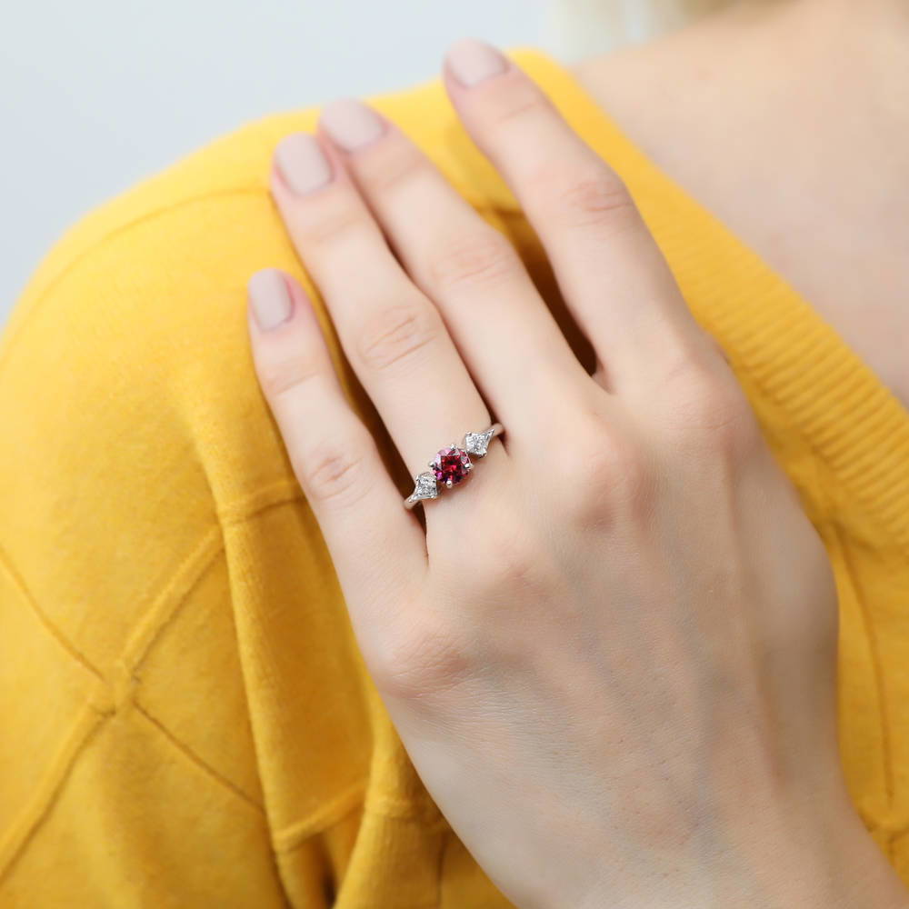 Model wearing 3-Stone Red Round CZ Ring in Sterling Silver, 2 of 7