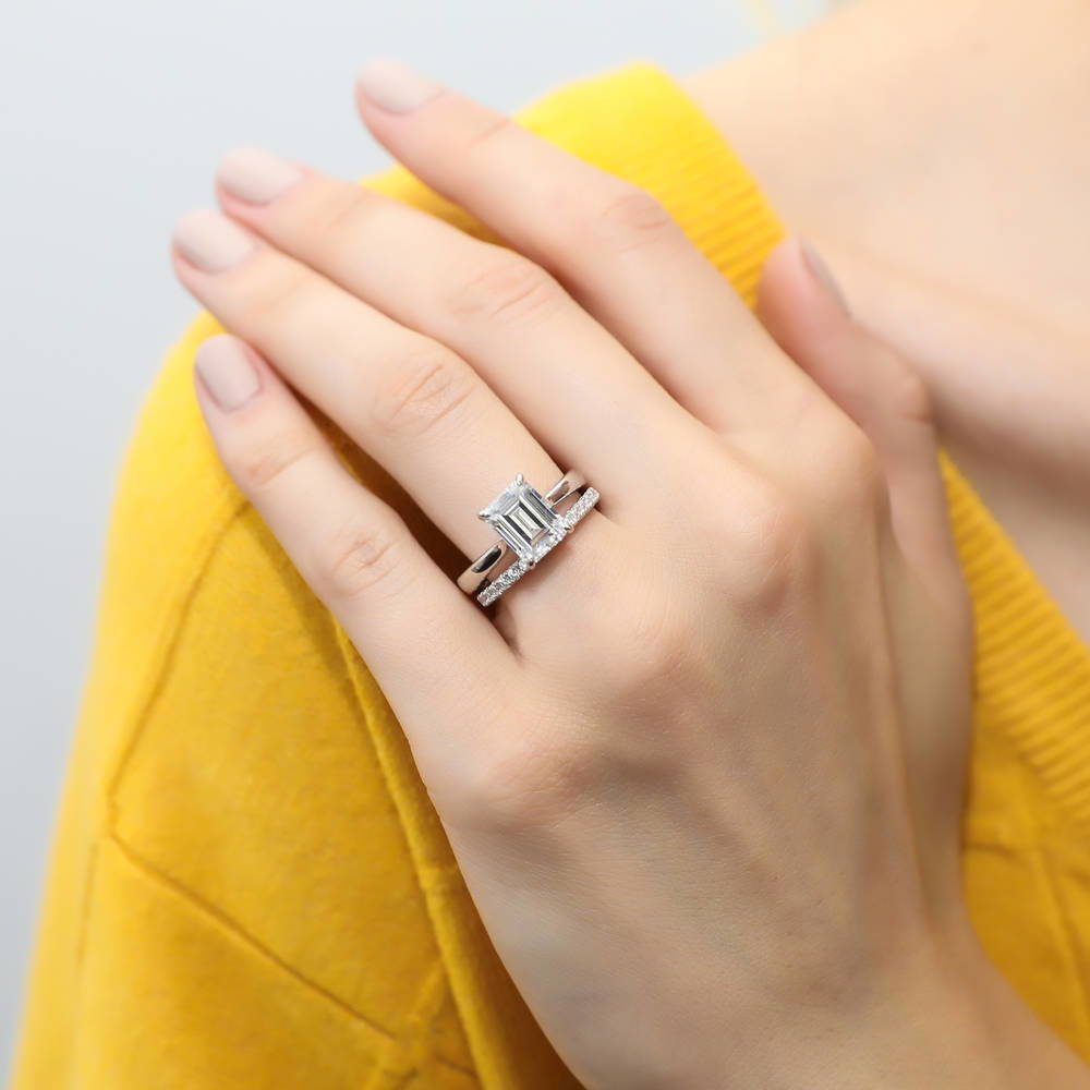Model wearing Solitaire 2.6ct Emerald Cut CZ Ring Set in Sterling Silver, 2 of 15
